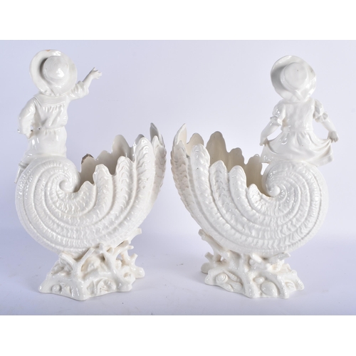 696 - A LARGE PAIR OF 19TH CENTURY CONTINENTAL CREAMWARE CORNUCOPIA VASES formed with young children. 30 c... 