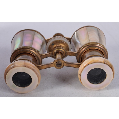 701 - A PAIR OF MOTHER OF PEARL OPERA GLASSES. 10 cm x 7 cm.