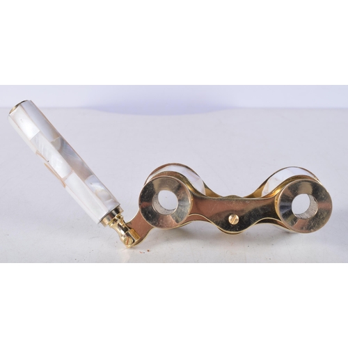 711 - A PAIR OF MOTHER OF PEARL OPERA GLASSES. 18 cm x 8 cm.