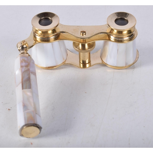 713 - A PAIR OF MOTHER OF PEARL OPERA GLASSES. 18 cm x 8 cm.