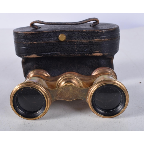 724 - A PAIR OF MOTHER OF PEARL OPERA GLASSES. 10 cm x 7 cm.