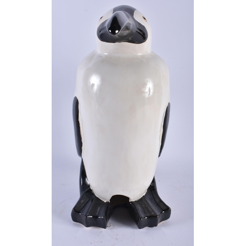 740 - A LARGE CONTINENTAL CERAMIC FIGURE OF A PENGUIN. 44 cm x 17 cm.