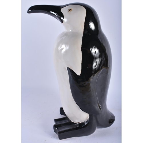 740 - A LARGE CONTINENTAL CERAMIC FIGURE OF A PENGUIN. 44 cm x 17 cm.