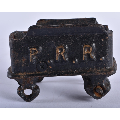 741 - AN EARLY CAST IRON RAILWAY TENDER. 9 cm x 6 cm.