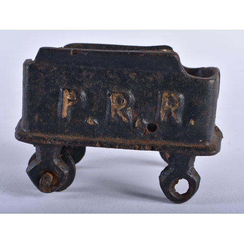 741 - AN EARLY CAST IRON RAILWAY TENDER. 9 cm x 6 cm.