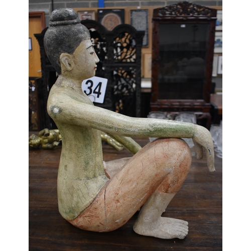 753 - A LARGE SOUTHEAST ASIAN PAINTED WOOD FIGURE OF A BUDDHA. 58 cm x 38 cm.