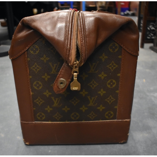 759 - A LOUIS VUITTON TRAVEL BAG. 64 cm x 48cm.