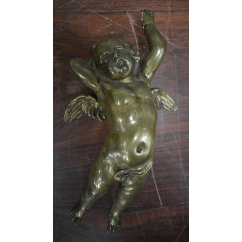 763 - THREE ANTIQUE BRONZE CHERUBS. 31 cm wide. (3)