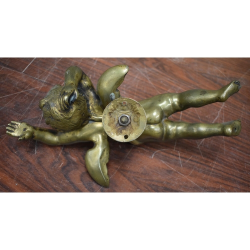 763 - THREE ANTIQUE BRONZE CHERUBS. 31 cm wide. (3)