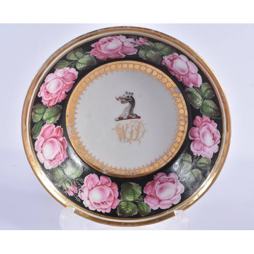 80 - AN EARLY 19TH CENTURY CHAMBERLAINS WORCESTER TEACUP AND SAUCER painted with a banding of roses. 13 c... 