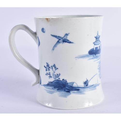 94 - A FINE 18TH CENTURY WORCESTER BLUE AND WHITE PORCELAIN WAISTED MUG painted with a figure fishing bef... 