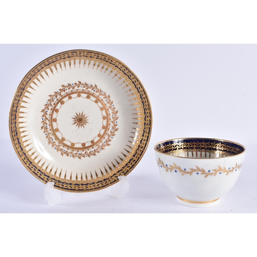 95 - TWO EARLY 19TH CENTURY CHAMBERLAINS WORCESTER TEABOWLS AND SAUCERS painted with gilt. 11 cm wide. (4... 