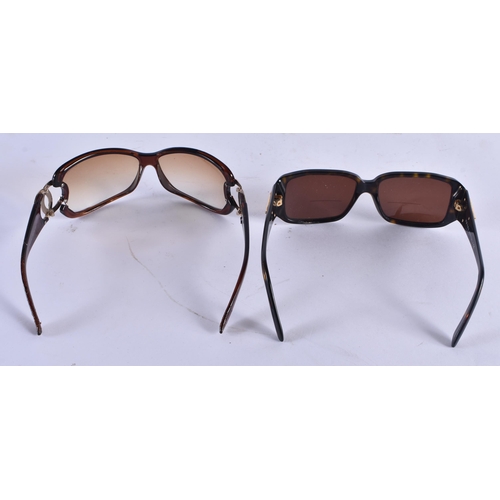 1005 - TWO PAIRS OF DESIGNER SUNGLASSES Prada & Chanel. 14.5 cm wide. (2)