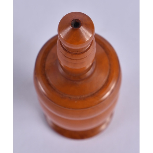 1008 - A RARE ART DECO AMBER CATALIN BAKELITE SCENT BOTTLE AND STOPPER. 18 grams. 6.25cm x 2.5 cm.