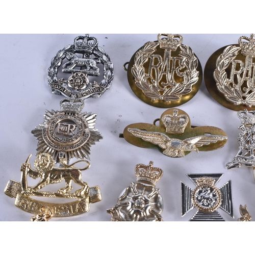 1014 - ASSORTED MILITARY CAP BADGES etc. 130 grams. (qty)