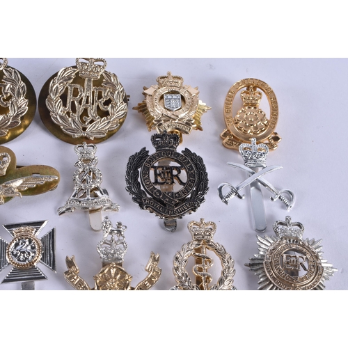 1014 - ASSORTED MILITARY CAP BADGES etc. 130 grams. (qty)