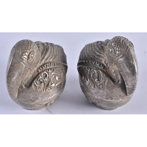 1017 - A PAIR OF CAMBODIAN WHITE METAL BIRD BOXES AND COVERS. 112.4 grams. Largest 6.75 cm x 5.25cm.