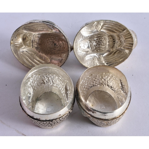 1022 - A PAIR OF CAMBODIAN WHITE METAL BIRD BOXES AND COVERS. 69.4 grams. Largest 5.5 cm x 4 cm.