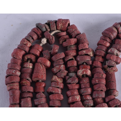 1038 - AN EARLY ISLAMIC MIDDLE EASTERN CORAL NECKLACE. 15 grams. 69 cm long.