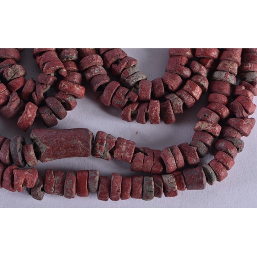 1038 - AN EARLY ISLAMIC MIDDLE EASTERN CORAL NECKLACE. 15 grams. 69 cm long.