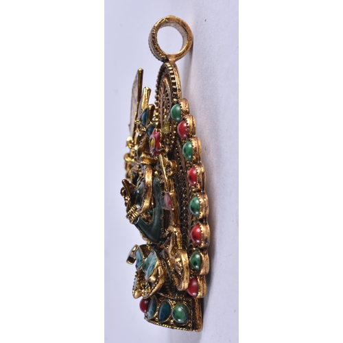 1039 - A TIBETAN NEPALESE YELLOW METAL CORAL AND TURQUOISE INSET BUDDHA PENDANT. 85.6 grams. 8.5 cm x 6.5 c... 