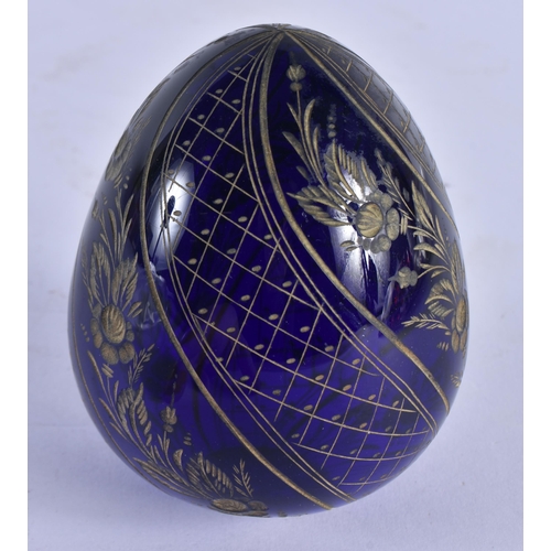 1040 - A FABERGE BLUE GLASS EGG. 199 grams. 9 cm x 7.25cm.