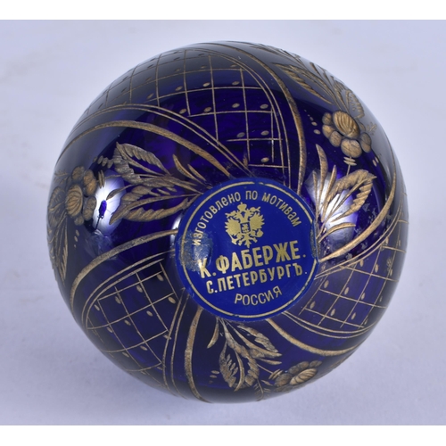 1040 - A FABERGE BLUE GLASS EGG. 199 grams. 9 cm x 7.25cm.