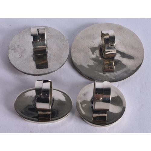 1044 - FOUR MIDDLE EASTERN RINGS. 78.4 grams. Largest 5.5 cm wide. (4)