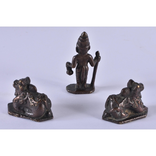 1052 - THREE ANTIQUE INDIAN BRONZES. 248.8 grams. 6.25cm x 3.25cm. (3)