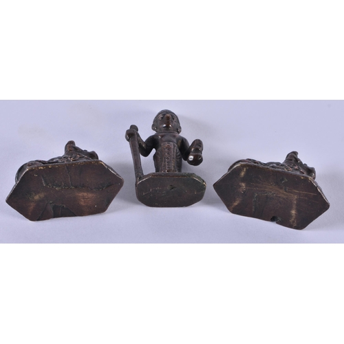 1052 - THREE ANTIQUE INDIAN BRONZES. 248.8 grams. 6.25cm x 3.25cm. (3)