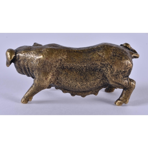 1053 - AN ANTIQUE CONTINENTAL BRONZE FIGURE OF A PIG. 192.5 grams. 7.25cm x 3.5 cm.