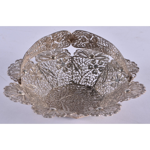 1061 - A CONTINENTAL WHITE METAL FILIGREE BASKET. 70.2 grams. 13.25cm x 8.5 cm.