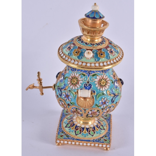 1066 - A Continental Silver Gilt and Enamel Samovar. 161 grams. 10.5 cm x 7.25cm x 7 cm.