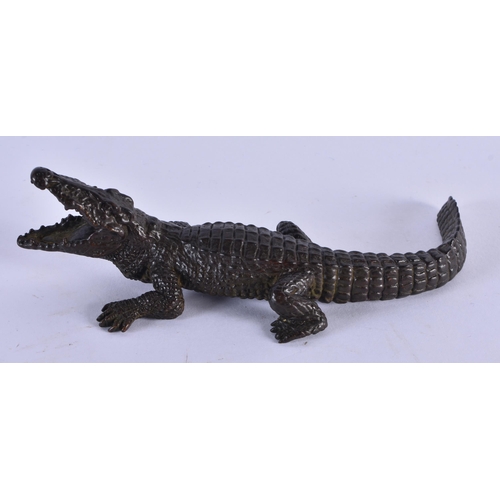 1067 - A JAPANESE BRONZE CROCODILE OKIMONO. 13 cm wide.