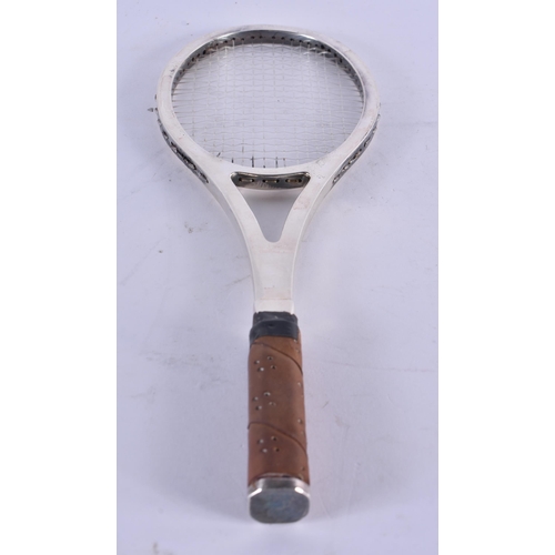 1079 - A VINTAGE SILVER TENNIS RACKET. 28 cm x 8 cm.