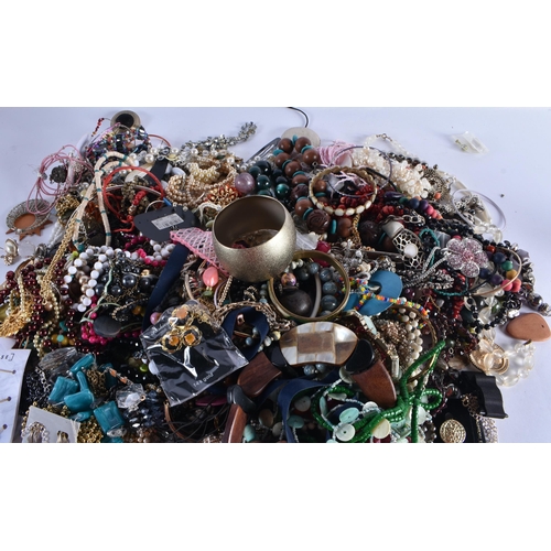 1087 - A LARGE BAG OF COSTUME JEWELLERY. (qty)