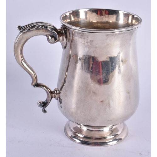 1088 - A GEORGE III SILVER TANKARD. 211 grams. London 1758. 10.25cm high.