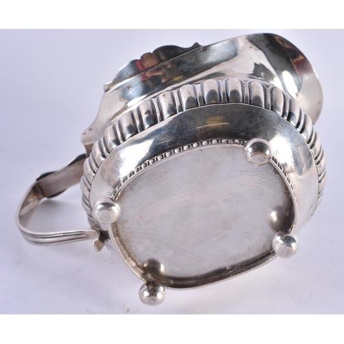 1090 - A GEORGE III SILVER CREAM BOAT. London 1808. 226 grams. 10 cm x 15.5 cm.