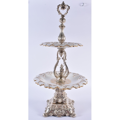 1094 - A RARE LARGE 19TH CENTURY CONTINENTAL SILVER AND BOHEMIAN GLASS EPERGNE formed on a rococo base with... 