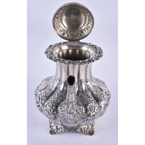 1106 - A GEORGE III IRISH SILVER REPOUSSE COFFEE POT. Dublin 1832. 1158 grams. 27 cm x 24 cm.