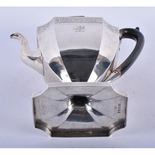 1109 - AN EARLY 19TH CENTURY LONDON SILVER BRIGHT CUT ARMORIAL COFFEE POT. 921 grams. 28 cm x 18 cm.