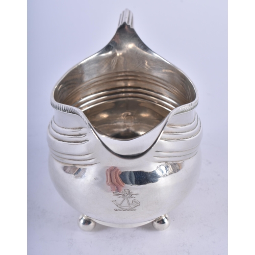 1111 - A GEORGE III SILVER CREAM JUG. London 1811. 156 grams. 14.5 cm x 8.5 cm.