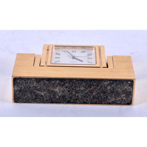 1121 - A WAKO ENAMELLED CLOCK. 237 grams. 6.25cm x 4.5 cm.