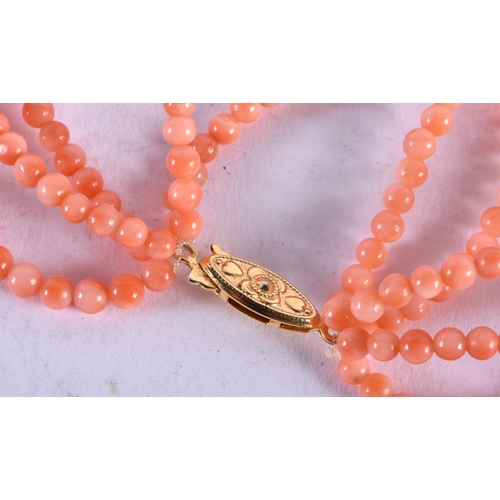 1156 - AN ART DECO MULTI STRAND CORAL NECKLACE. 60 grams. 72 cm long.