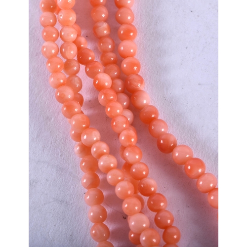 1156 - AN ART DECO MULTI STRAND CORAL NECKLACE. 60 grams. 72 cm long.