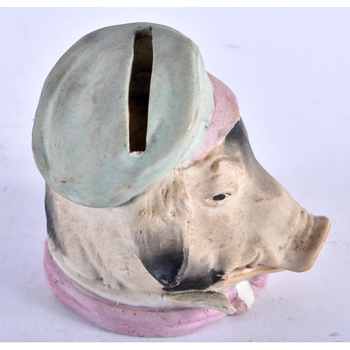 1160 - AN ANTIQUE NOVELTY BISQUE PORCELAIN PIG MONEY BOX. 8 cm x 8 cm.