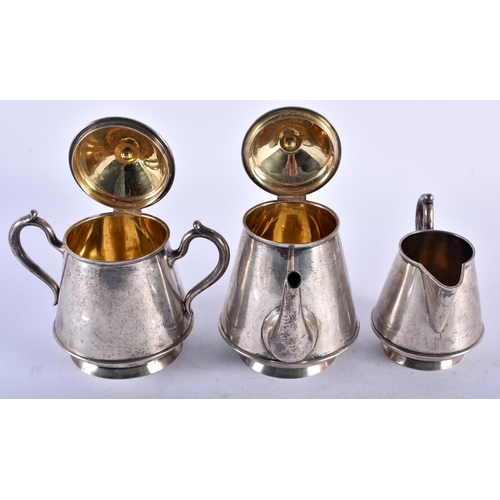 1165 - AN ANTIQUE RUSSIAN THREE PIECE SILVER TEASET. 810 grams. Largest 17 cm x 14.5 cm. (3)