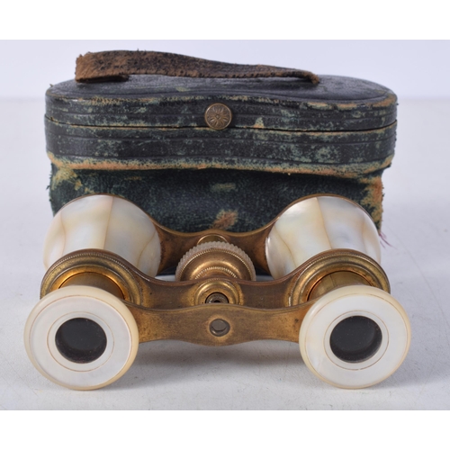 1193 - A PAIR OF MOTHER OF PEARL OPERA GLASSES. 10 cm x 7 cm.