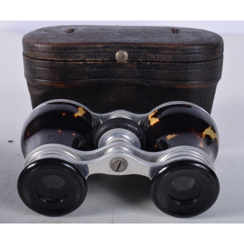 1223 - A PAIR OF ANTIQUE TORTOISESHELL OPERA GLASSES. 7 cm x 10 cm.