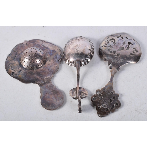 1237 - THREE 19TH CENTURY CONTINENTAL SILVER SPOONS in various forms and sizes. 127 grams. Largest 14 cm x ... 